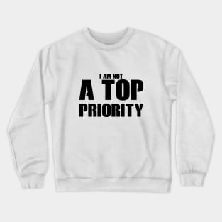 i m not a top priority Crewneck Sweatshirt